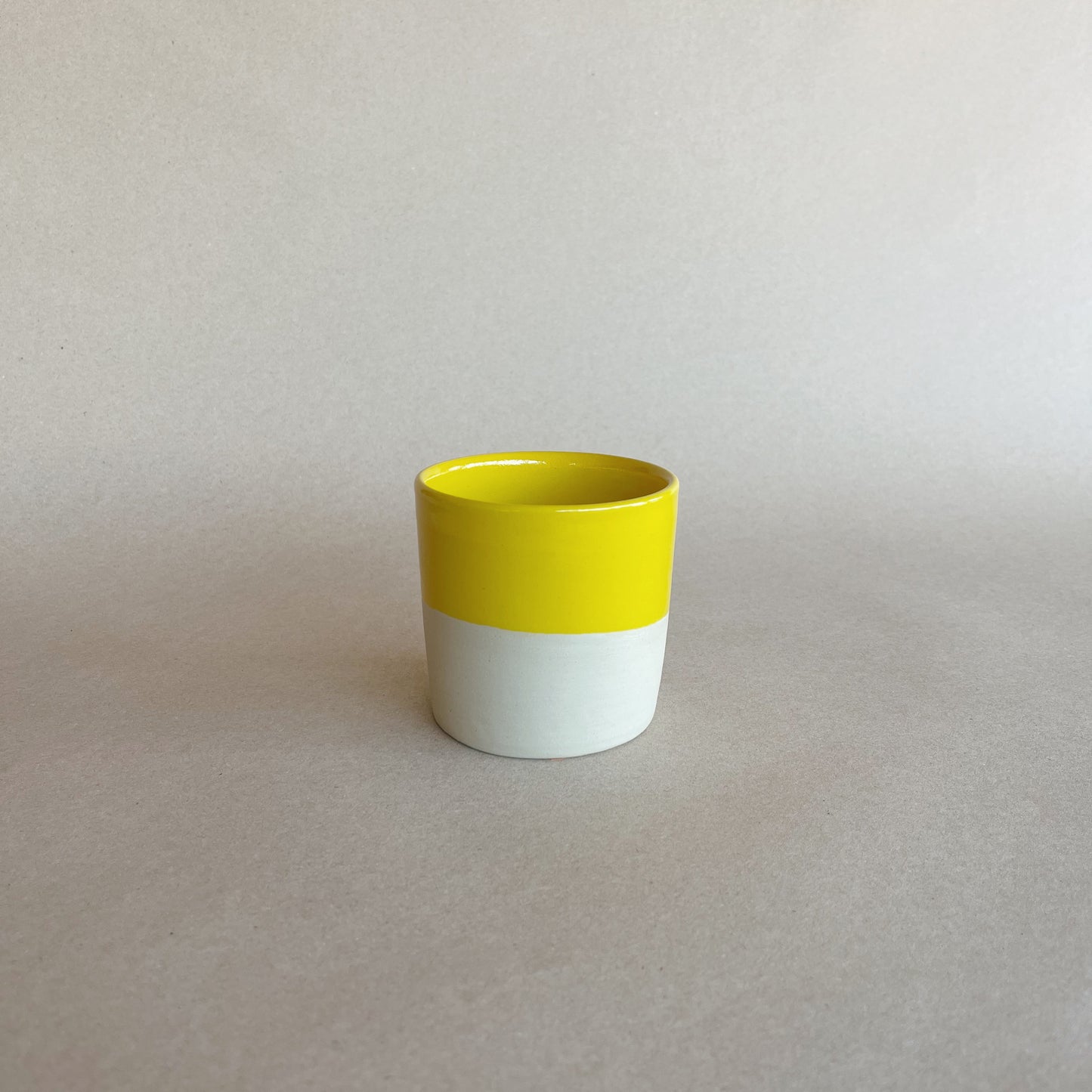 handmade ceramic cup yellow