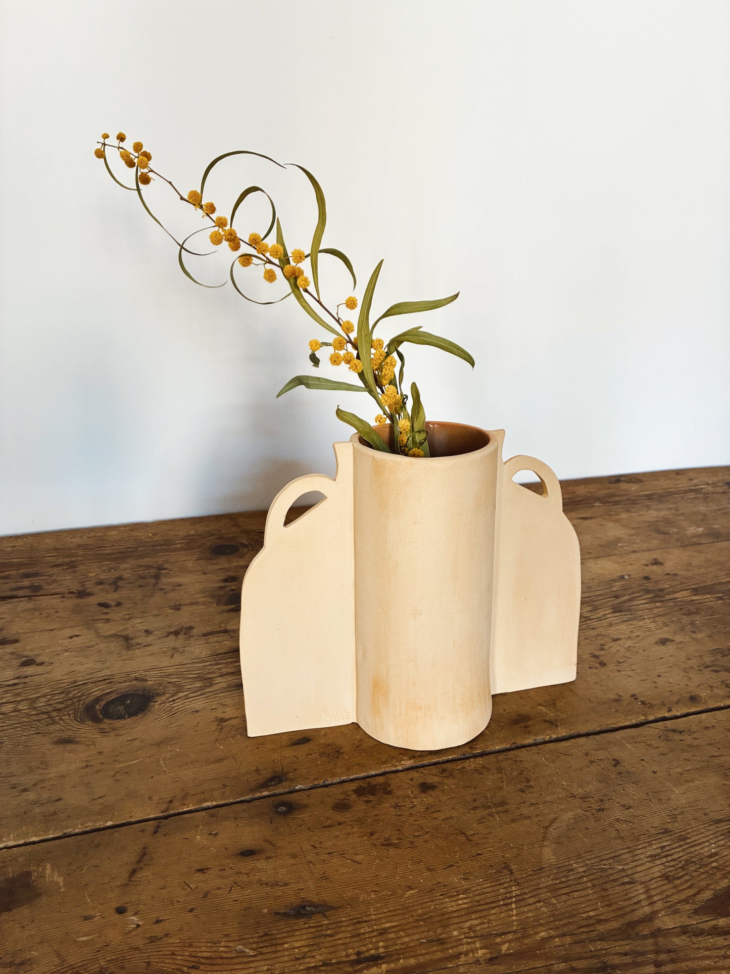 Side view of Botilla ceramic vase Herència collection